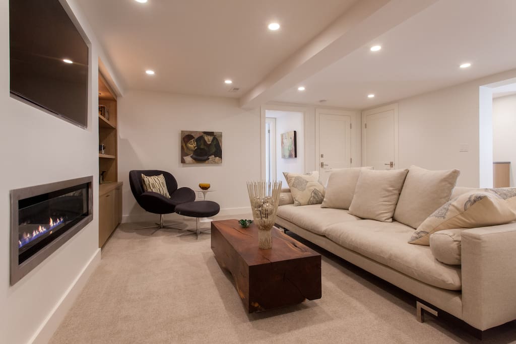 This is your private living room. It is much more than just a room. It is an entire floor 800 square foot sweet privately set on its own lower level of the home.