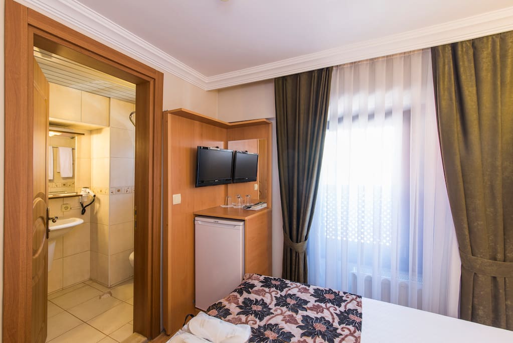 A minibar supplied with complimentary water & mineral water. LCD TV with international satellite channels, bedroom slippers and standard toiletries, a hair dryer & free Wi-Fi connection. Daily cleaning. Laundry & Ironing service for a small extra cost. Non-smoking rooms. Charming street view...