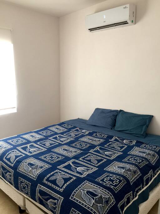 Habitación King-Size con aire acondicionado