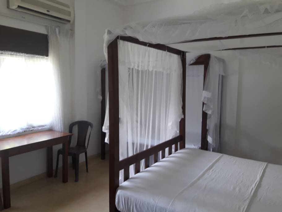 Rooms 1 and 2 have a double queen size and single beds with attached bathrooms