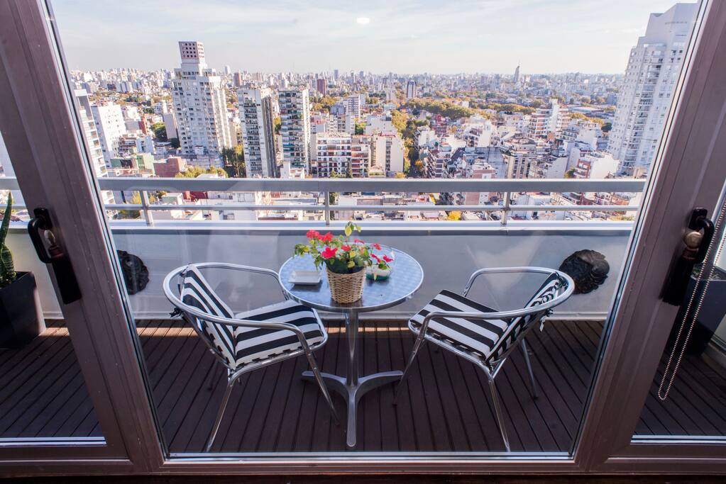 Drink in hand and Buenos Aires at your feet