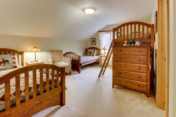 Upstairs "Crescent Room" with four single beds, especially designed and configured for kids