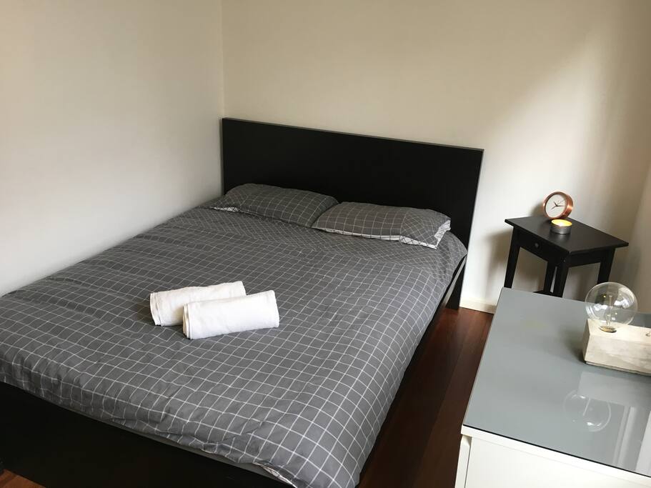Bedroom with open shutters