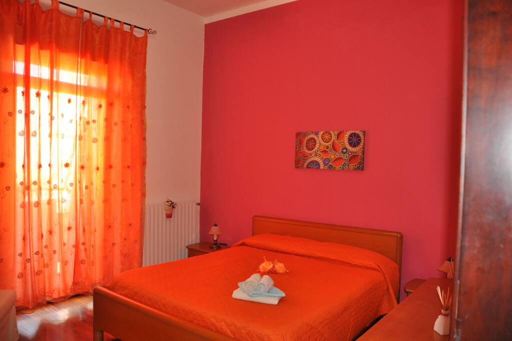 camera tripla con balcone e bagno privato