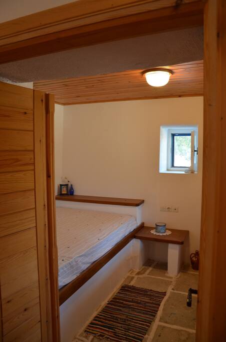 Main bedroom with one double and one single bed.
