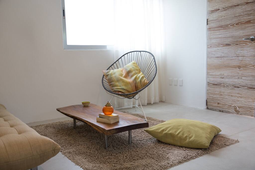 Bright living room. Comfortable seating.