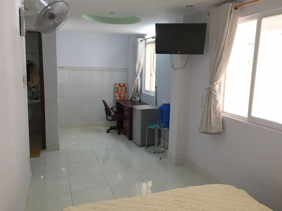 Desk, fridge, ROOM 1O1 - View on living room and private bathroom (bigger than Normal Double room)