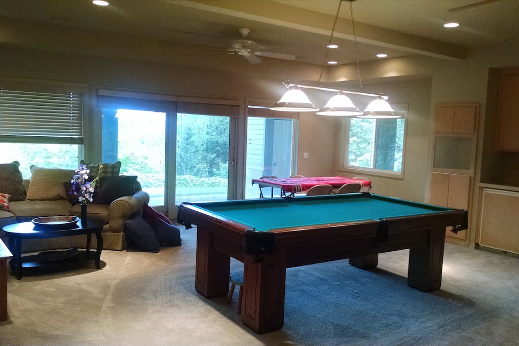 Shared common area: kitchenette, DISH TV, sitting area, table, pool table