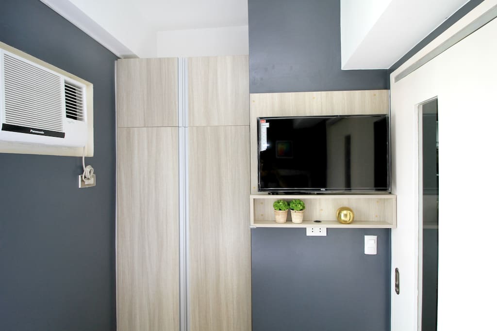 One side of the bedroom