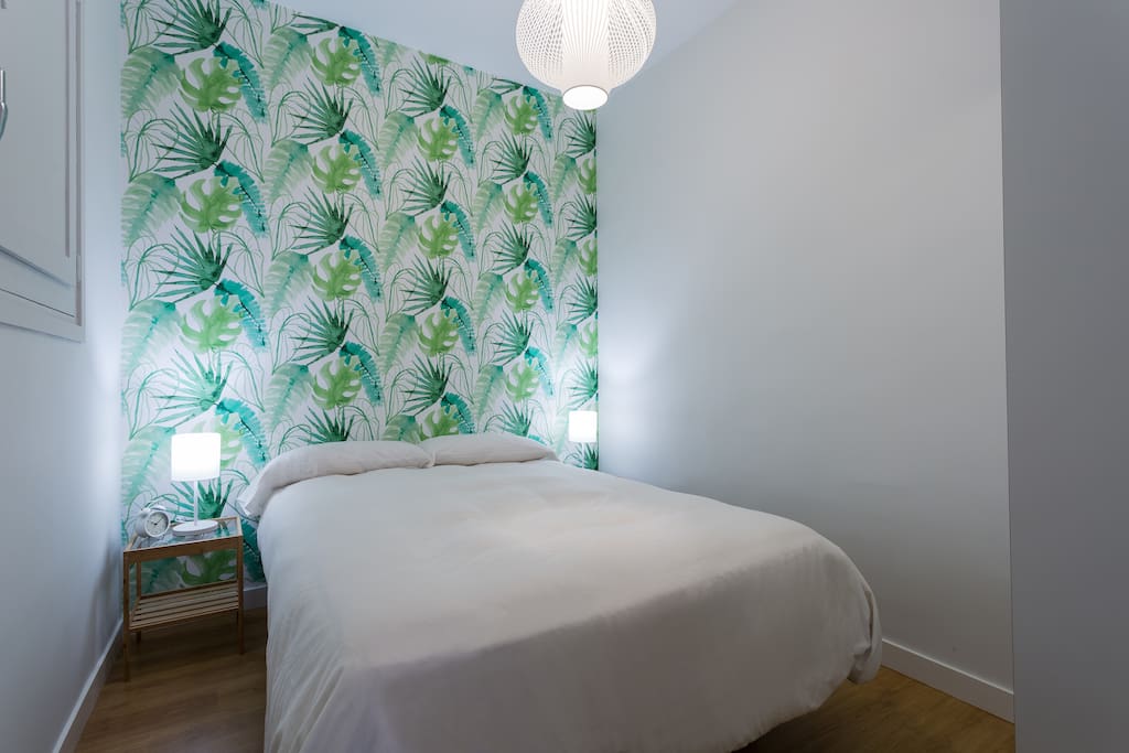 Bedroom with window to private "patio"