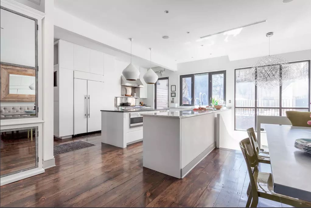 Kitchen: 2 dishwashers, SubZero fridge/freezer, Wolf range cooker (gas hob, 2 electric ovens) microwave, toaster, coffee machine, soda stream. Breakfast bar seats 4.