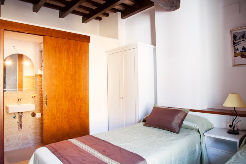 1st floor bedroom - 3 single beds and en suite bathroom