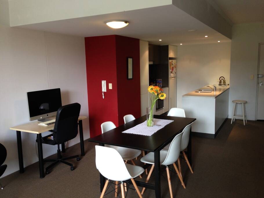 Dining table, kitchen, desk.