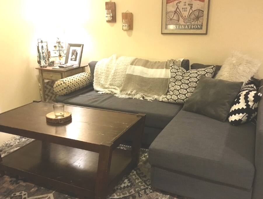 Sofa pulls out to make a full rectangle. Sleeps 2 comfortably.
