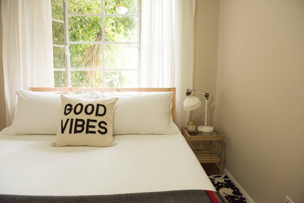 Cozy bedroom, Queen sized bed with lots of sunlight.