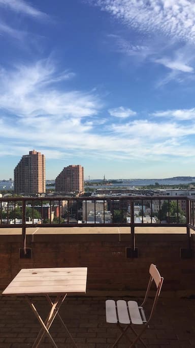 Balcony with Statue of Liberty view.