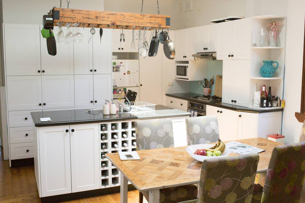 Kitchen with everything necessary for cooking. There's a separate bar fridge for your use.