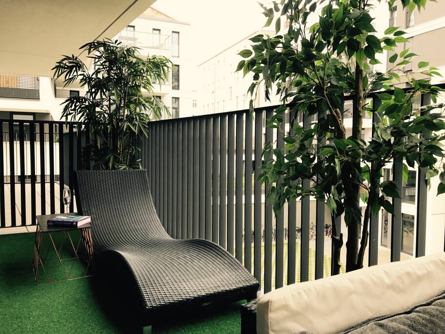 Relaxing daybed on the balcony