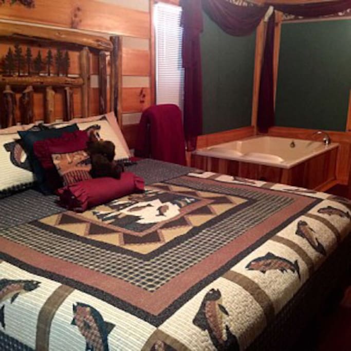Master with handcrafted log bed