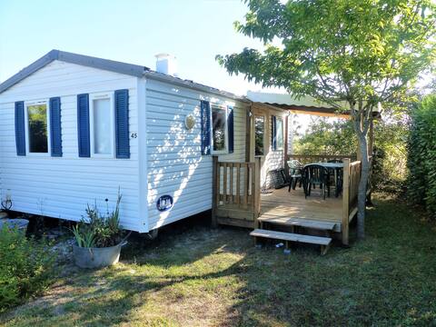 Mobile home in a lively village for 4 people