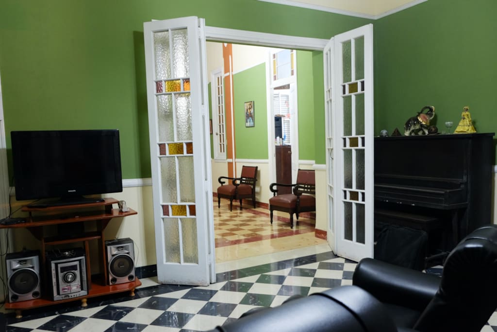 Relax in our chill living room, or step out to our private balcony overlooking the sights of Old Havana