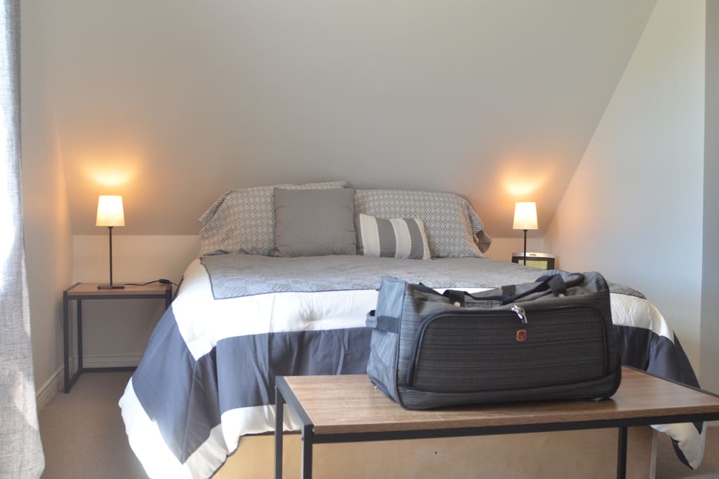 Master bedroom with queen size bed - top floor