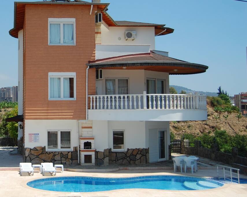 Detached 5 bedroom Villa with private swimming pool beside beach and town centre within walking distance.