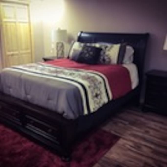 14x24 private bedroom with queen size bed, drawers under the bed and 2 closets with plenty of hangers. There is separate entrance thru garage into your room. Plus a full size bathroom all to yourself on this floor. Heated floors are a plus in this room.