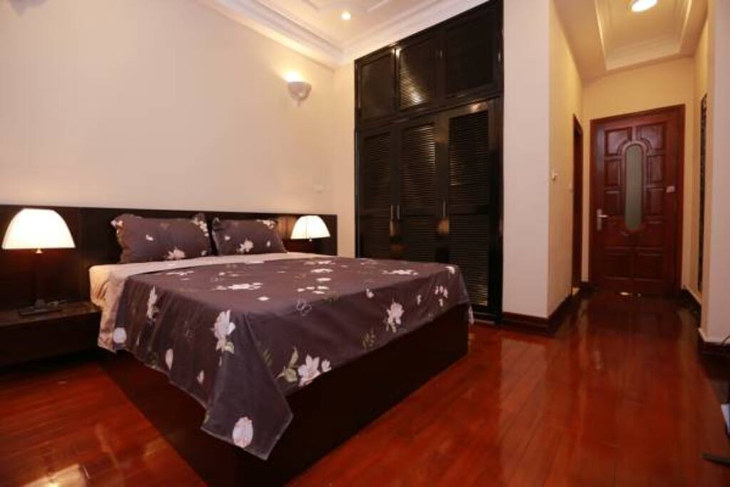 A balcony room with a huge bed for two.