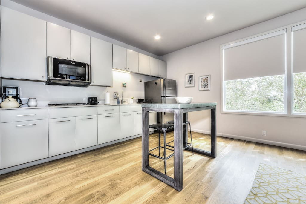 Kitchen and bar height table with stools