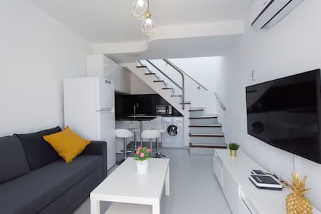 bungalow with terrace near the beach.