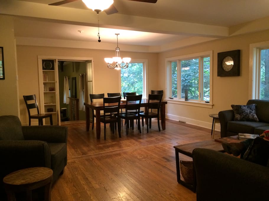 Living room w/ adjoining dining area.