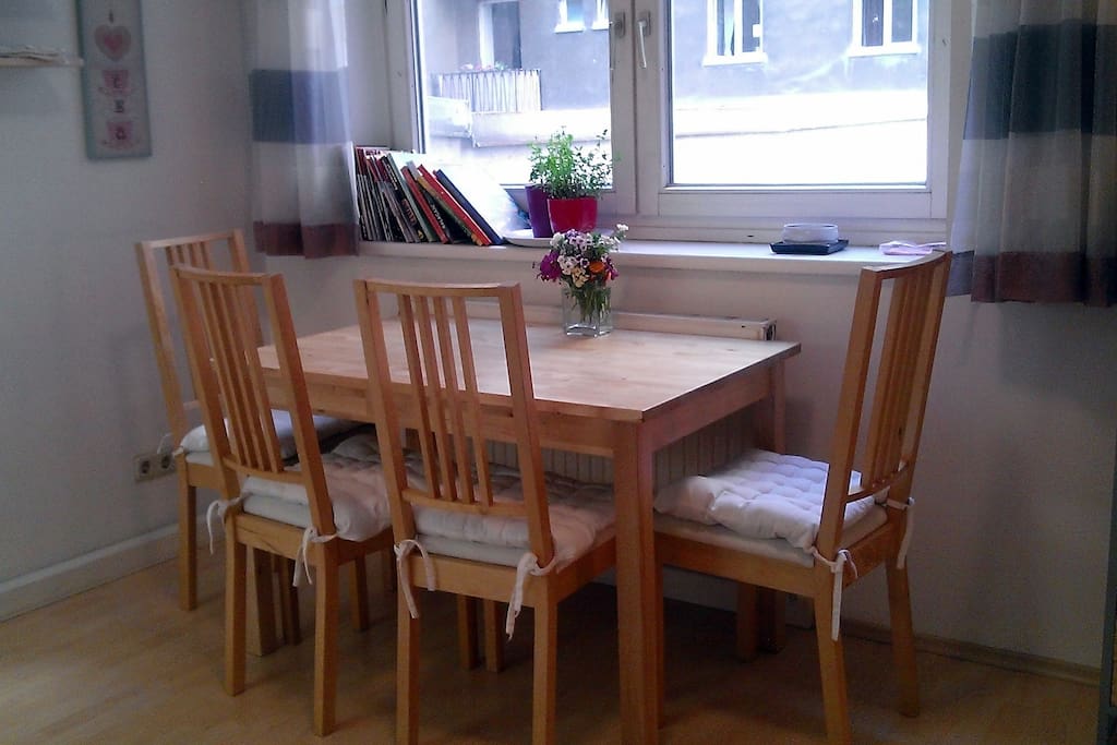 Dinner table in the main area with great natural light.
