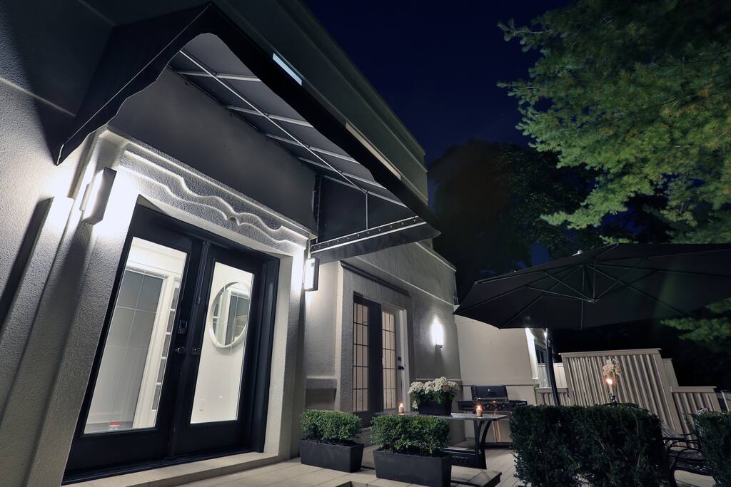 This front enrance is all yours, complete privacy.
To the right is the patio from the dining room. BBQ while watching the ships go by.