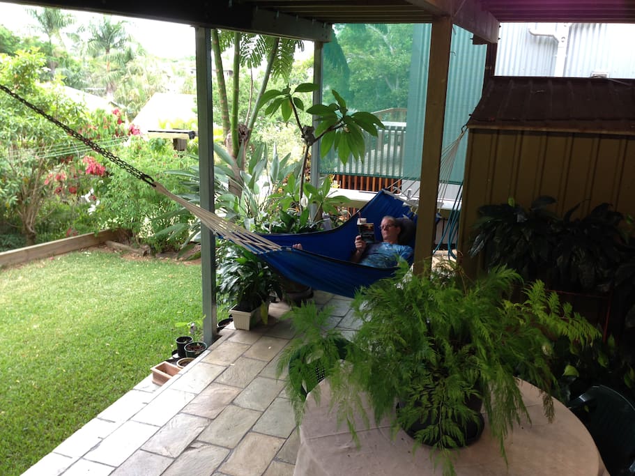 Table & chairs & hamac amongst the plants & greenery