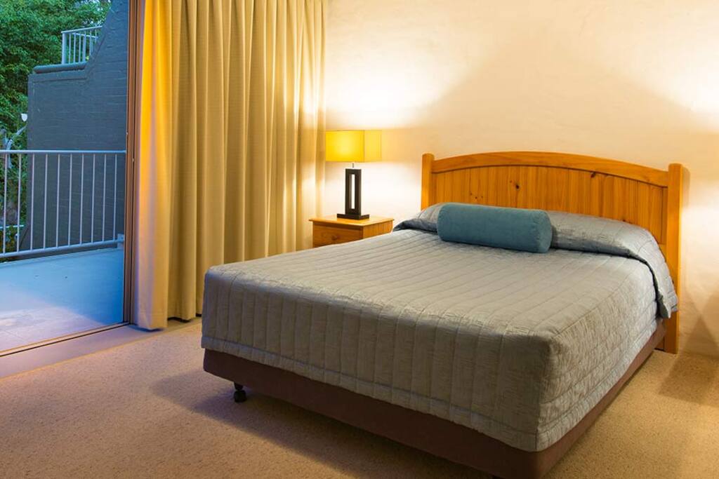 Master bedroom - queen bed, ensuite, walk-in wardrobe, balcony access
