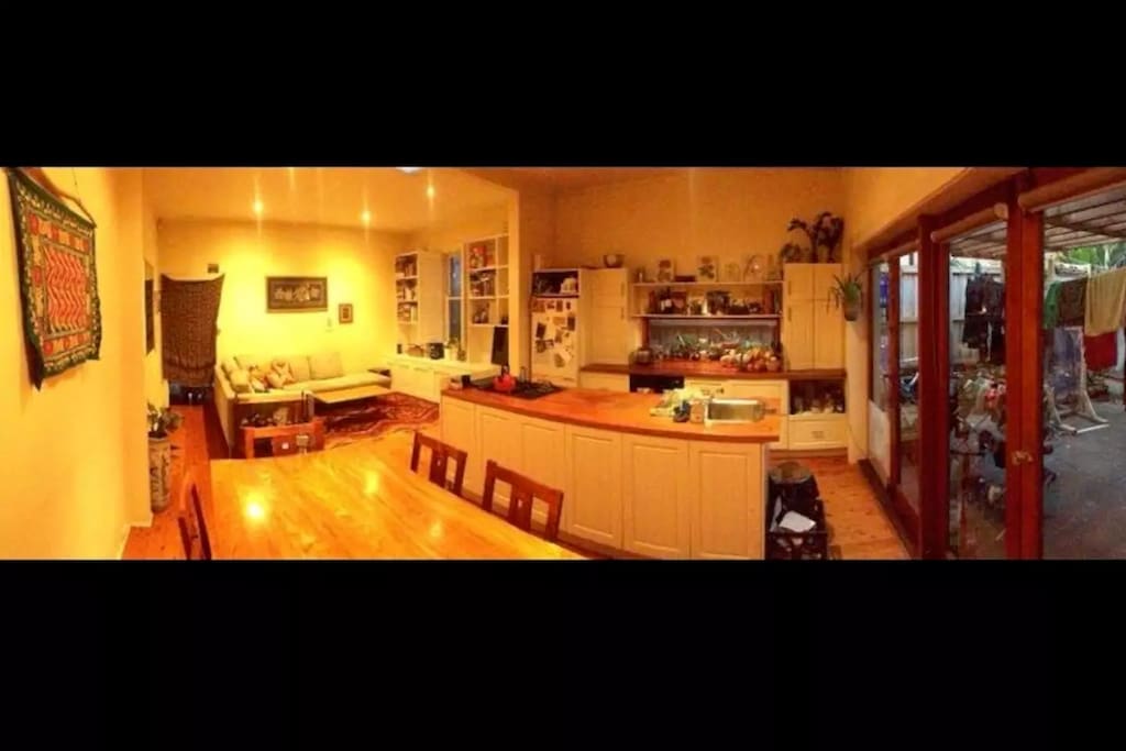 Large open plan living room with gas kitchen