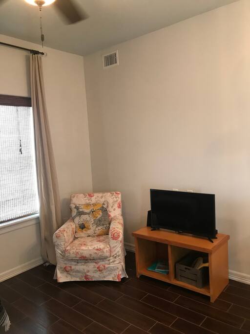 Living room smart tv and arm chair
