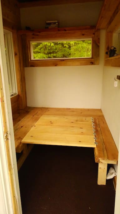 Boards flip down for sleeping comfort of the floor