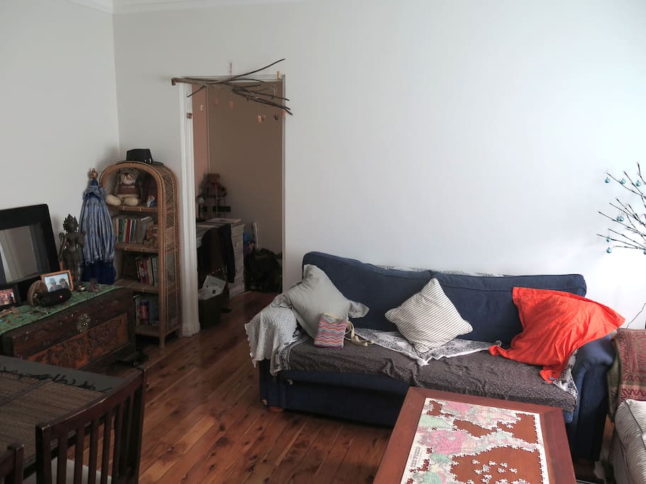 More living area, glimpse of desk