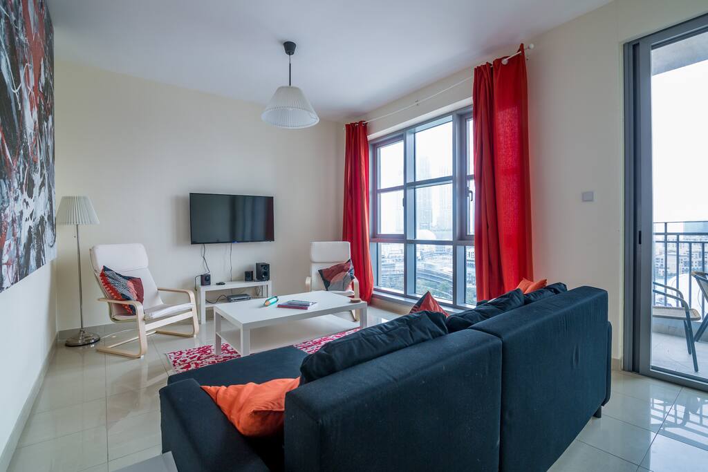 Living Room With Big Windows and view of Burj Khalifa, Dubai Opera, Dubai Fountain & Downtown Dubai