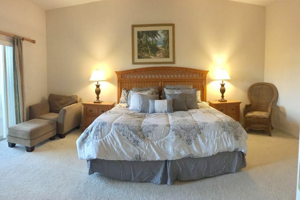 Master bedroom with own full bathroom and queen bed and walk in closet