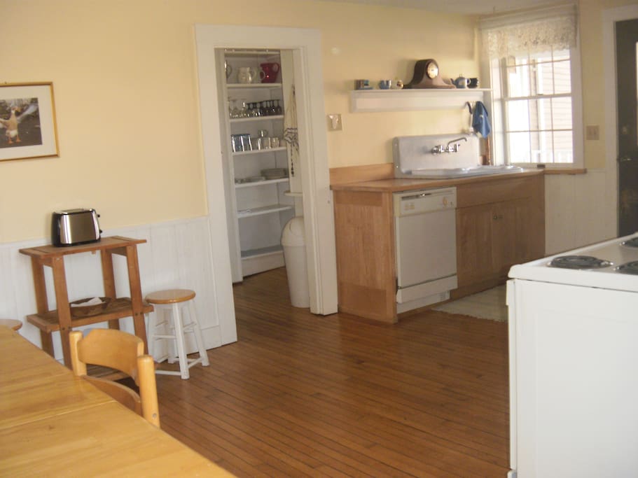 Kitchen with original farmhouse sink and walk-in pantry