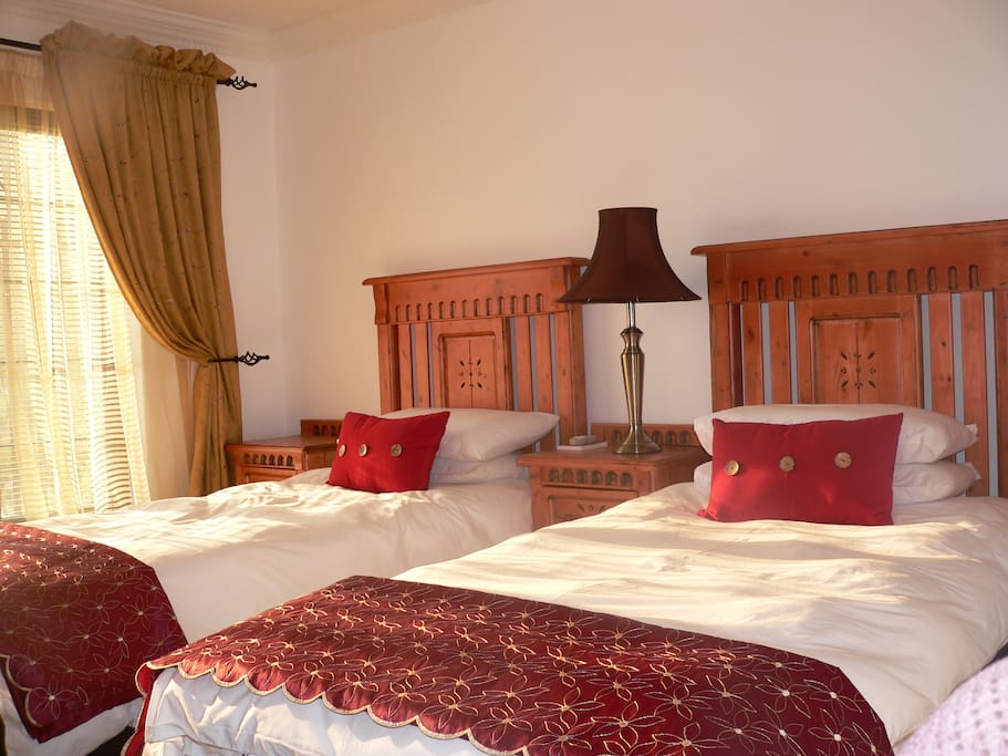 Rooms have a crisp clean, welcome feeling with Aircon, Dstv, Honesty bar and ameneties