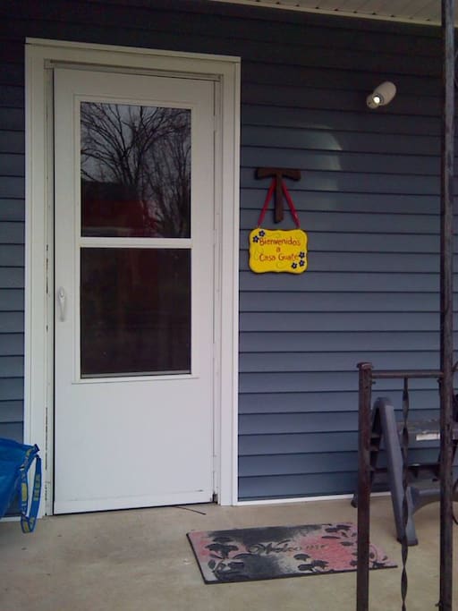 The front door, with handpainted welcome sign from one of our original donors (whose 5yo daughter was one of our interior painters!)