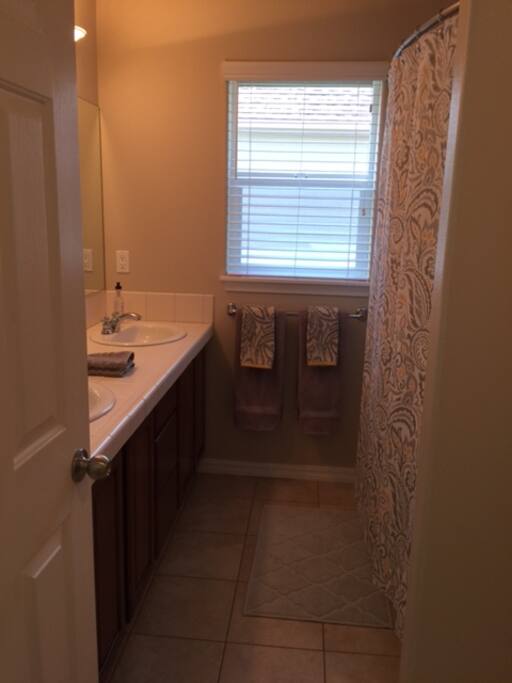 Private bathroom with two sinks.