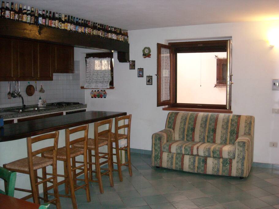 The amazing Bar style table with an extra two sits sofa bed next to it.