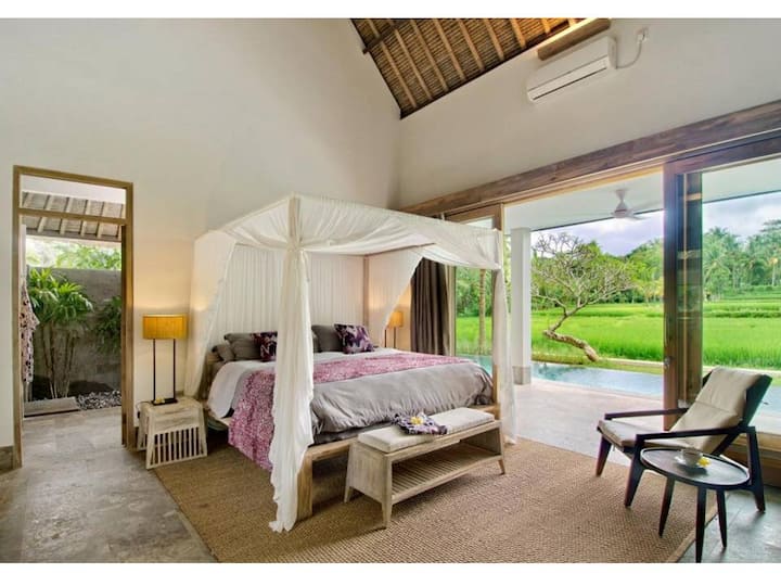 master bed room with open view to rice field