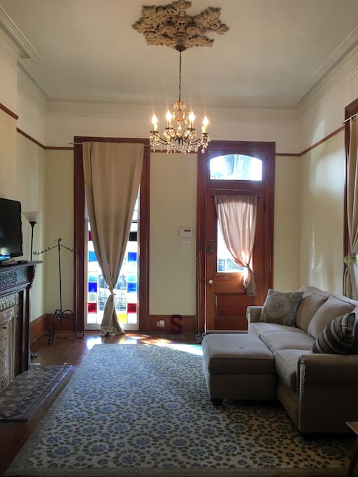 Front room / living room with stained glass front porch window
