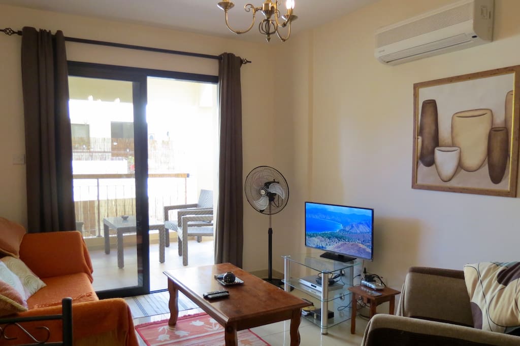 lounge with patio doors to balcony
